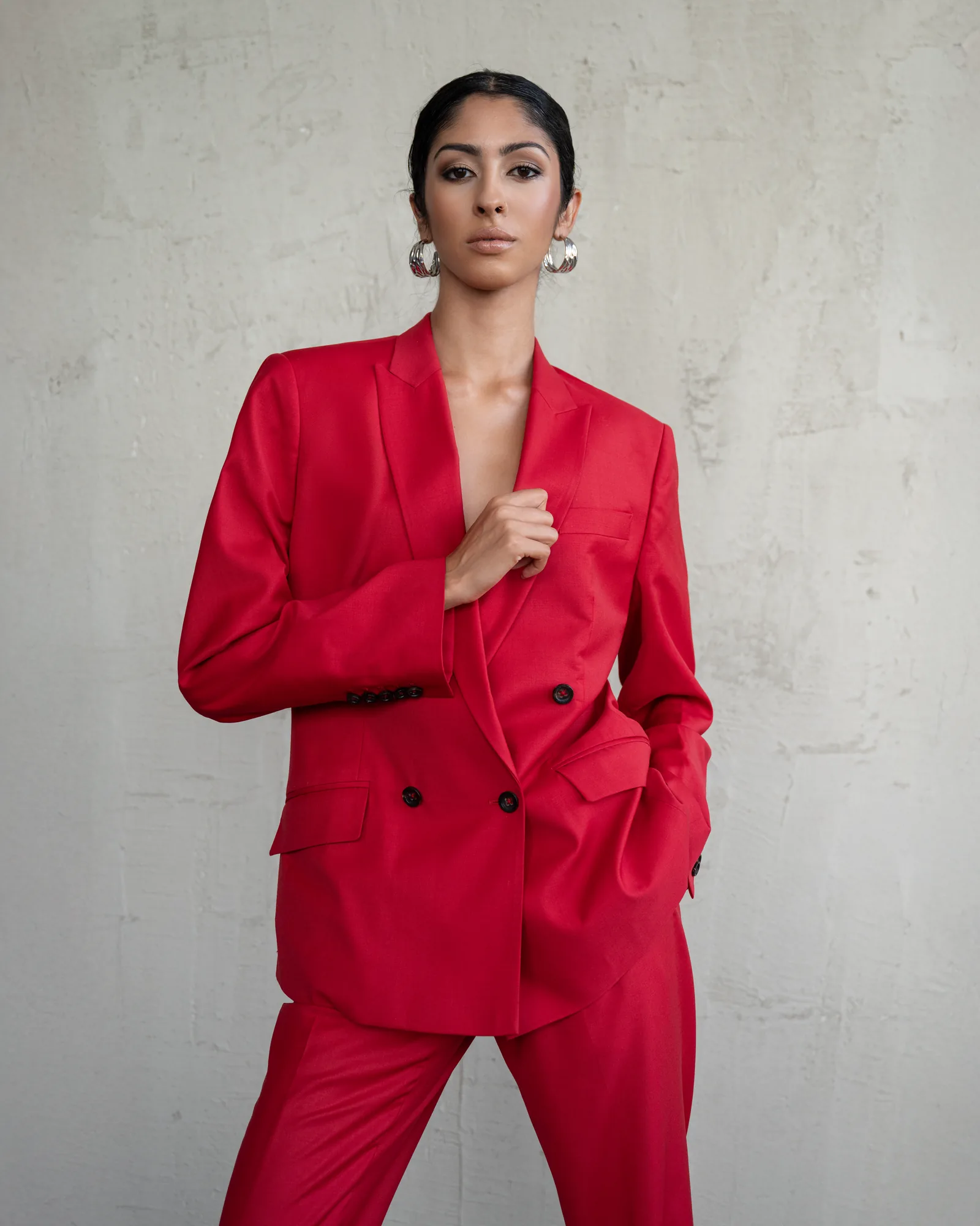 Veejay Floresca FW26, red suit