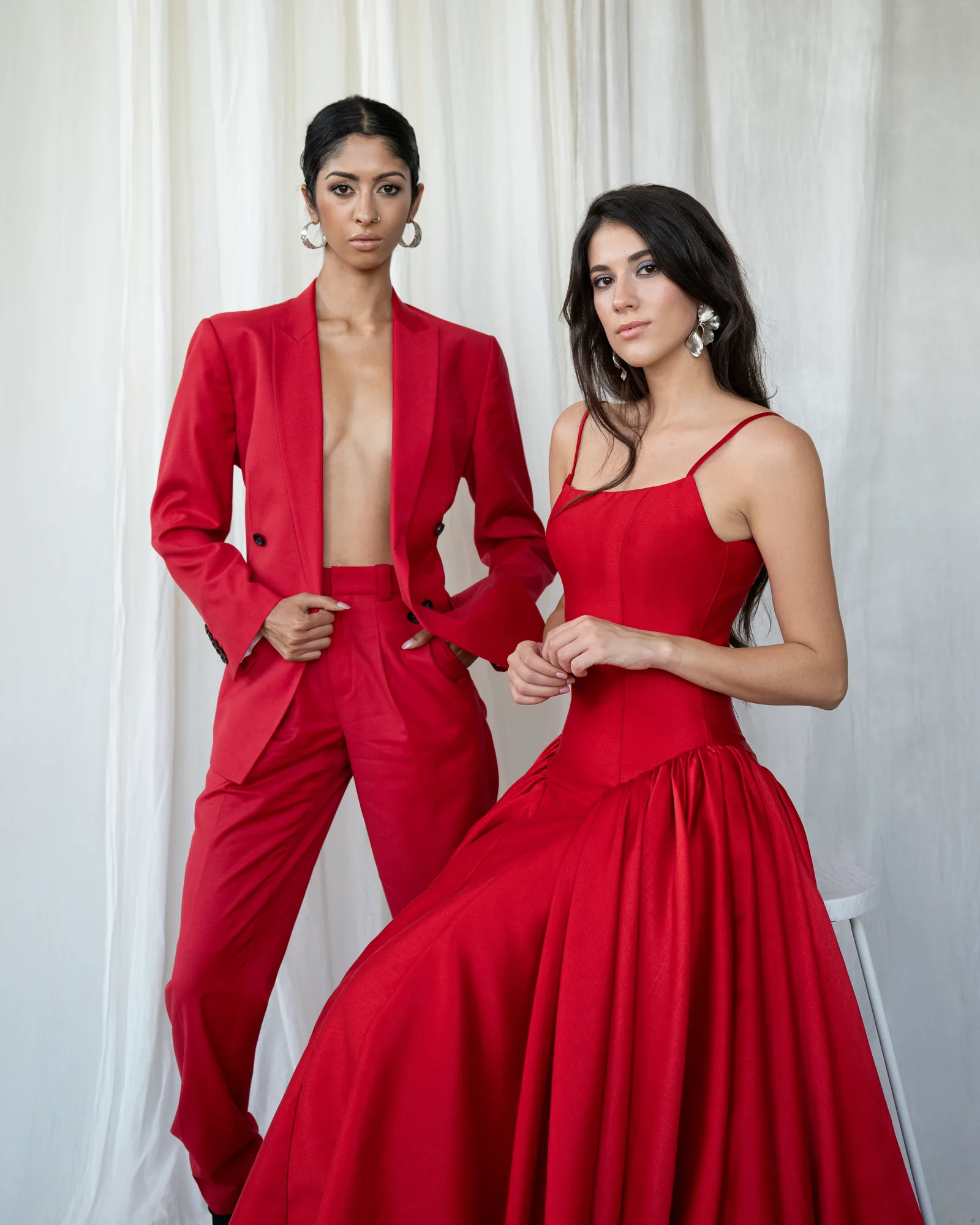 Veejay Floresca FW26, three models in red